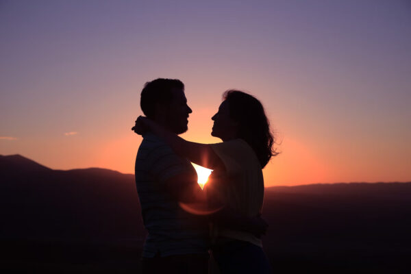 A person and person kissing Description automatically generated with medium confidence