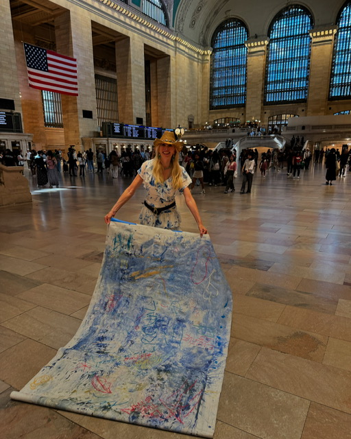 Cheriie Corso with her Art in Grand Central Station