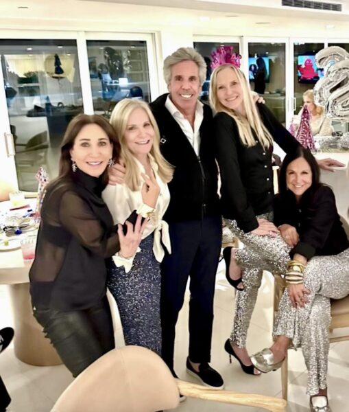 Palm Beach Pete New Year’s Eve group photo in Palm Beach with friends at a party