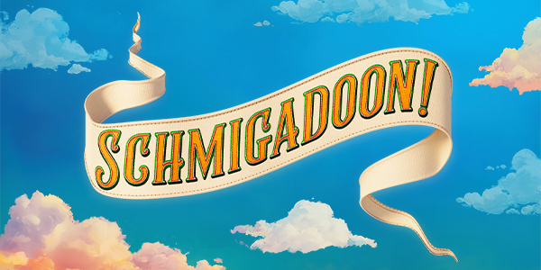 Broadway cast of Schmigadoon performing a lively musical number in a colorful, whimsical town setting.