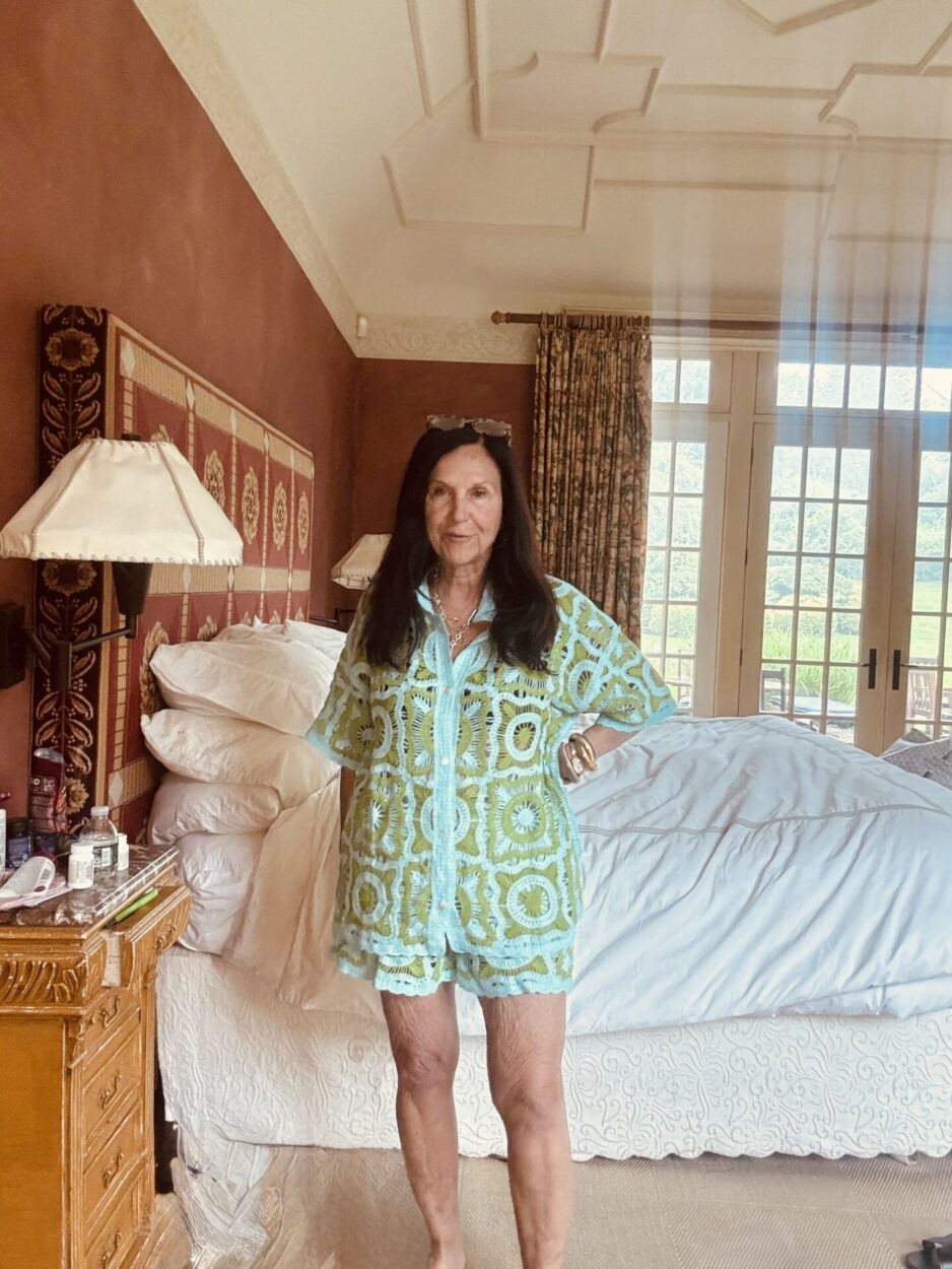 Woman showing her legs after significant weight loss while discussing crepey and loose skin around the thighs and knees.