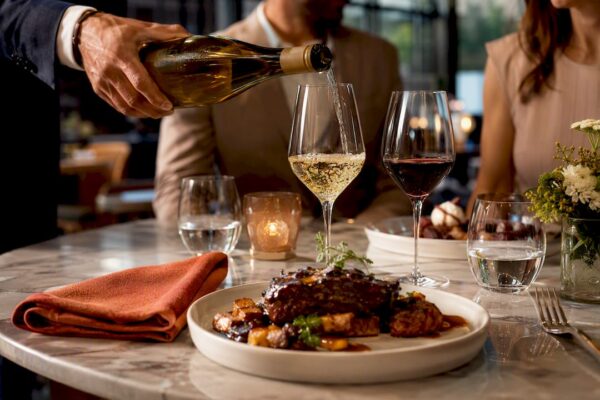 Wine glasses paired with an elegant dinner