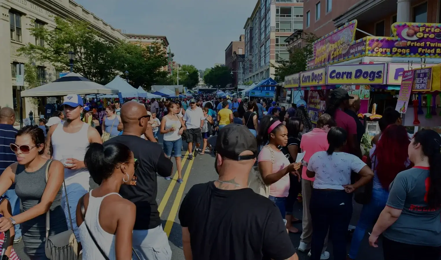 Crowds and food vendors at Yonkers Riverfest in downtown Yonkers