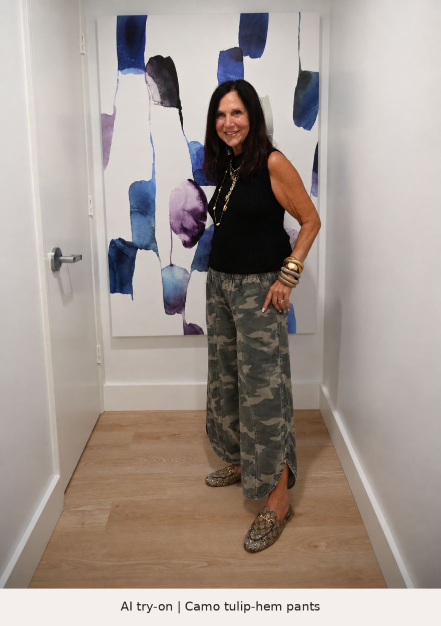 AI try-on of Stacy in camo tulip-hem wide-leg pants with a black sleeveless top and snakeskin mules